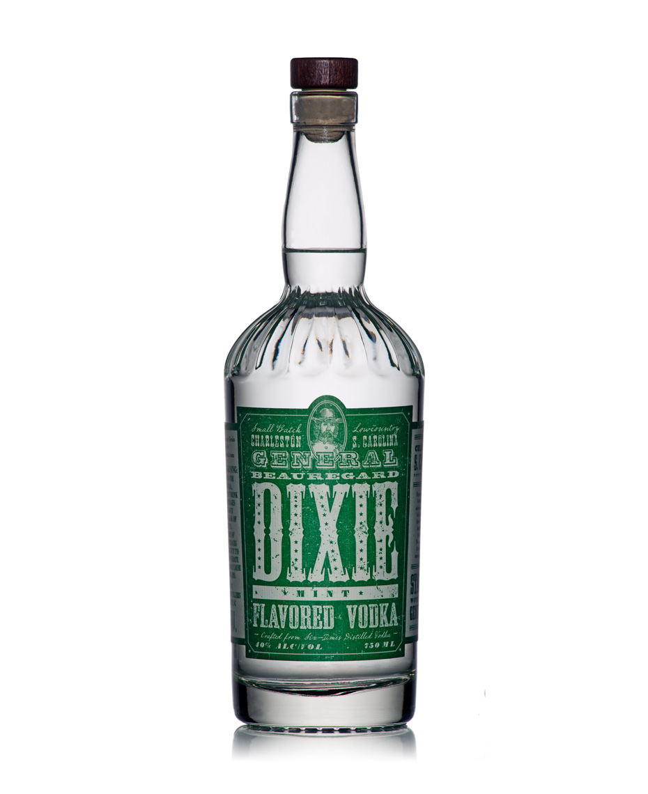 Green label on vodka bottle photographed on whgite background