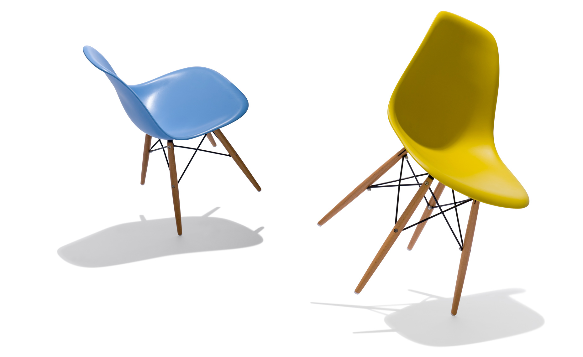 group shot of two dancing molded plastic chairs 