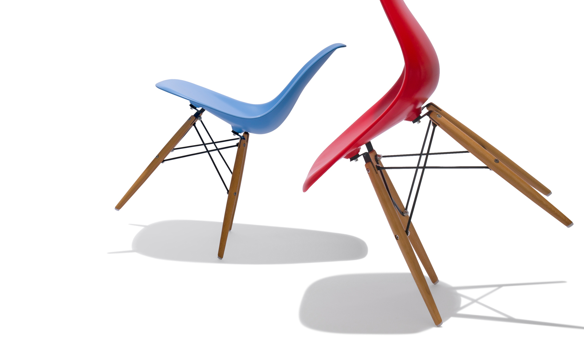 group of two modern dining chairs dancing